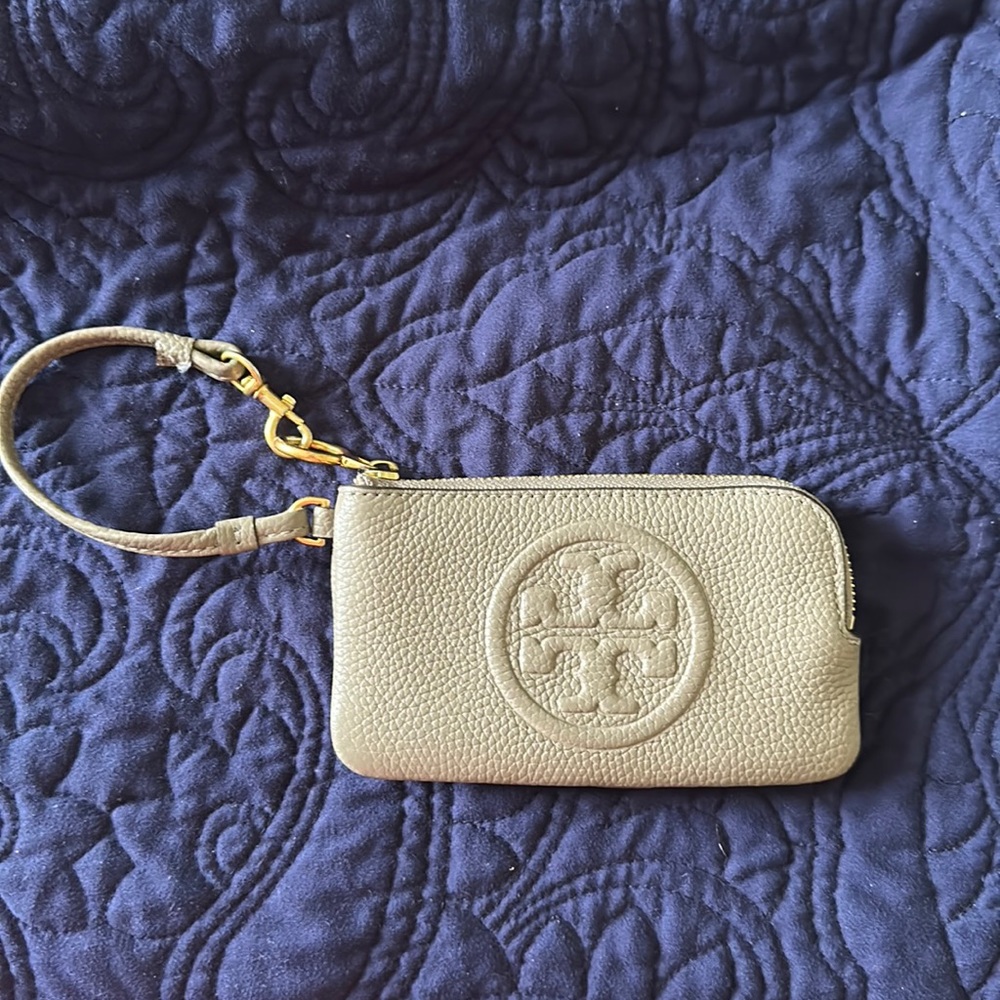Tory Burch wristlet in like new condition.
